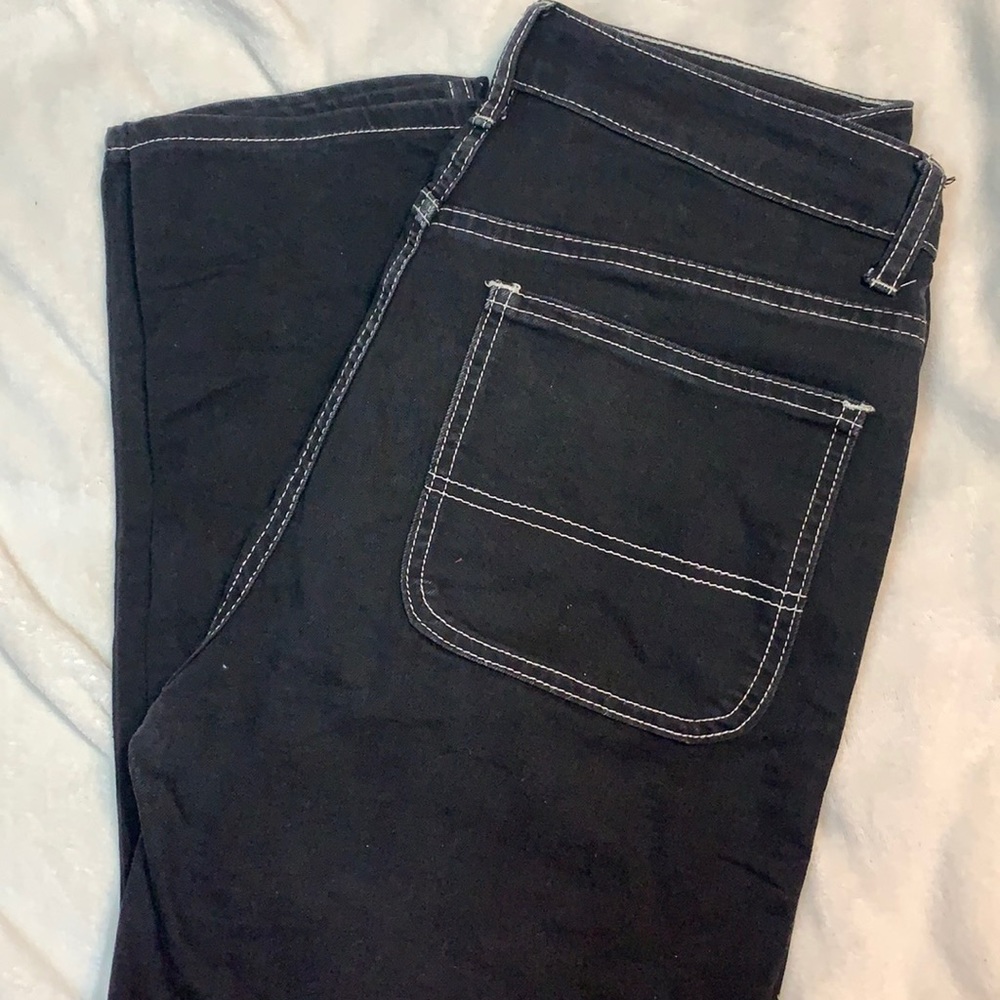 Black jeans with white stitching